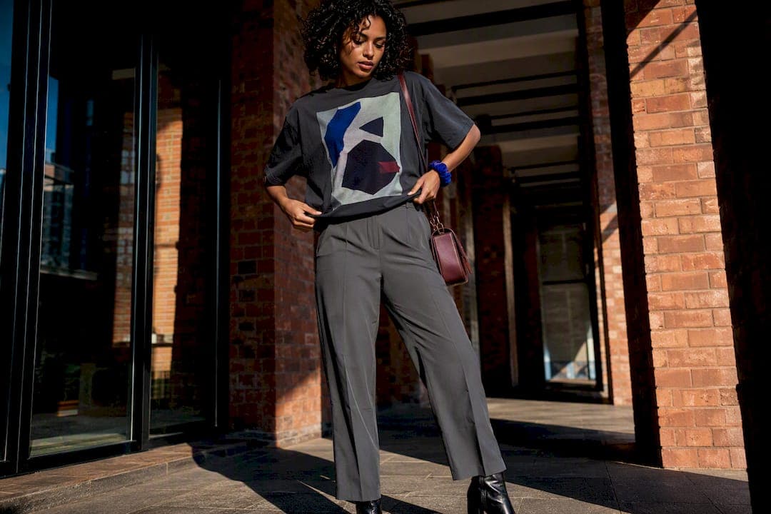 12 Graphic Tee Outfit Formulas That Modernize Band and Vintage Tees